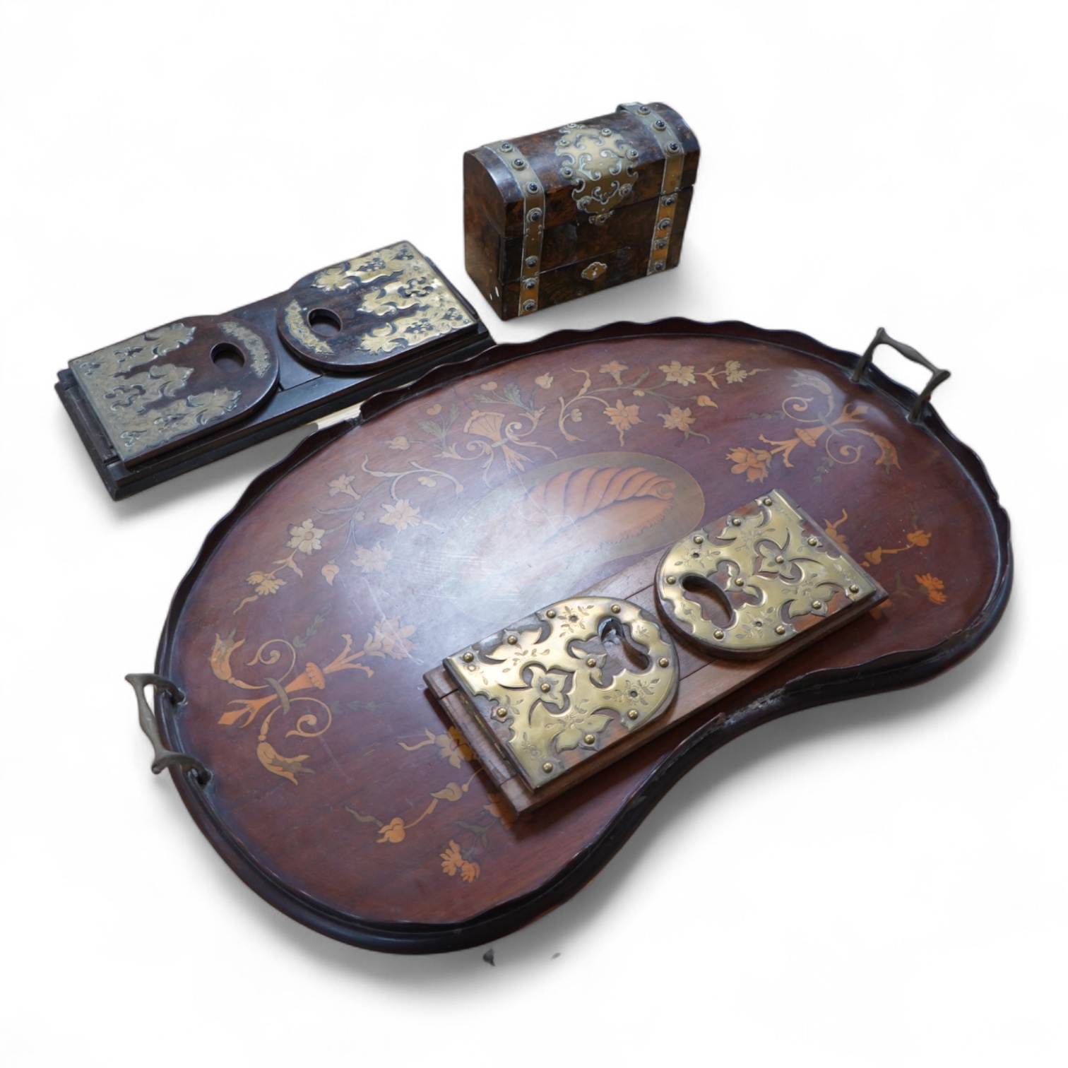 A Victorian domed scent bottle casket, two brass mounted book slides and a marquetry tray, 68cm